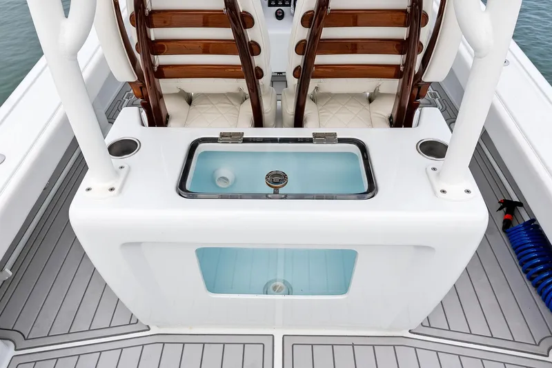 Slide: The Image of 2022 Barker Boatworks 26 Open deck with seating and livewell. - 25