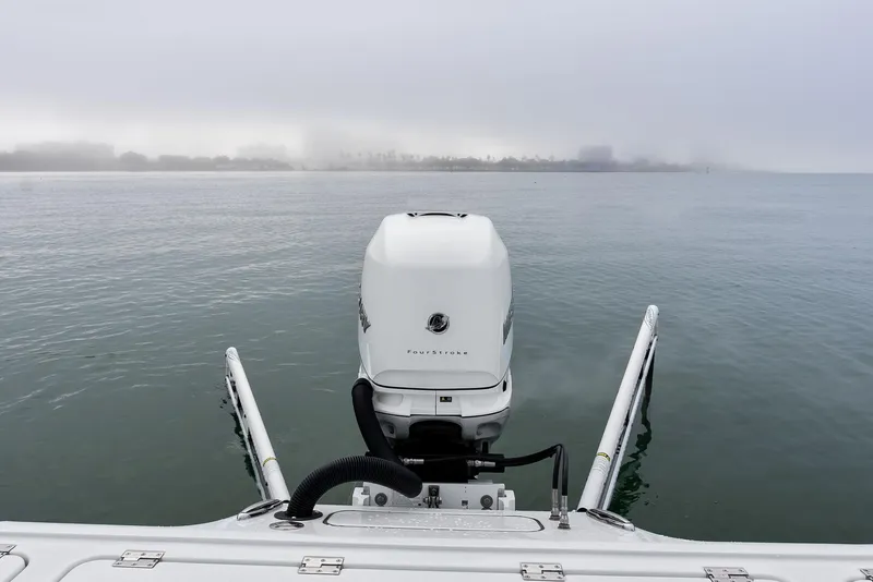 Slide: The Image of 2022 Barker Boatworks 26 Open on calm water with overcast sky. - 34