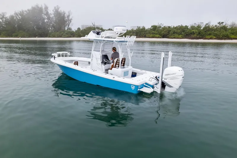 Slide: The Image of 2022 Barker Boatworks 26 Open on calm water, featuring sleek design and modern amenities. - 4