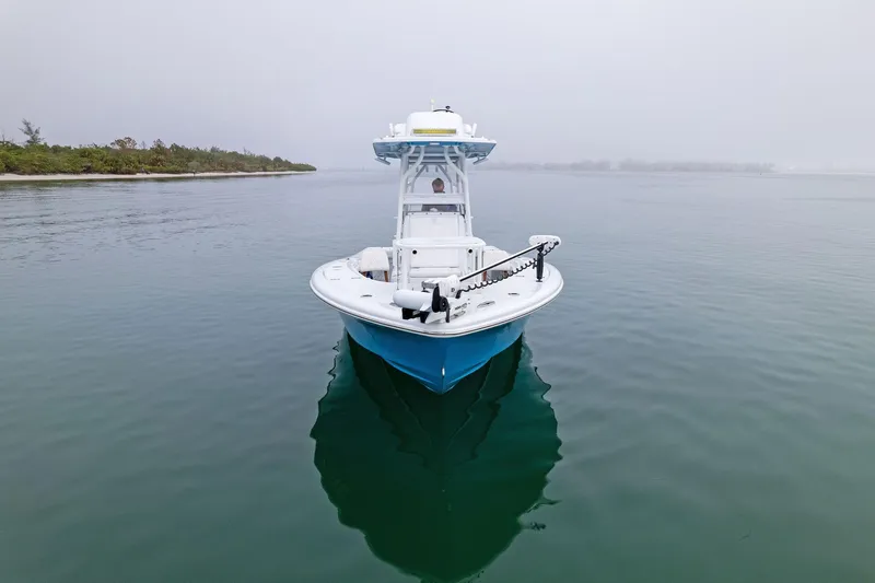 Slide: The Image of 2022 Barker Boatworks 26 Open on calm water, front view. - 7