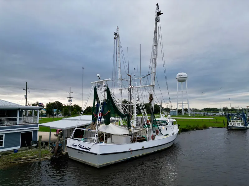 Slide: The Image of Fishing boat docked by the shore, Blanchard 69 Shrimper/Freezer, 2001 model. - 10