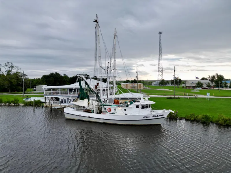 Slide: The Image of Blanchard 69 Shrimper/Freezer boat on a calm river, overcast sky, 2001 model. - 2