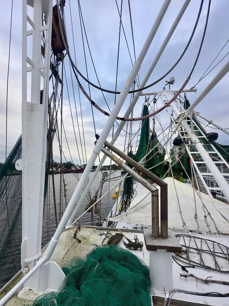 Slide: The Image of Blanchard 69 Shrimper/Freezer boat, 2001 model, with fishing nets and rigging on deck. - 20