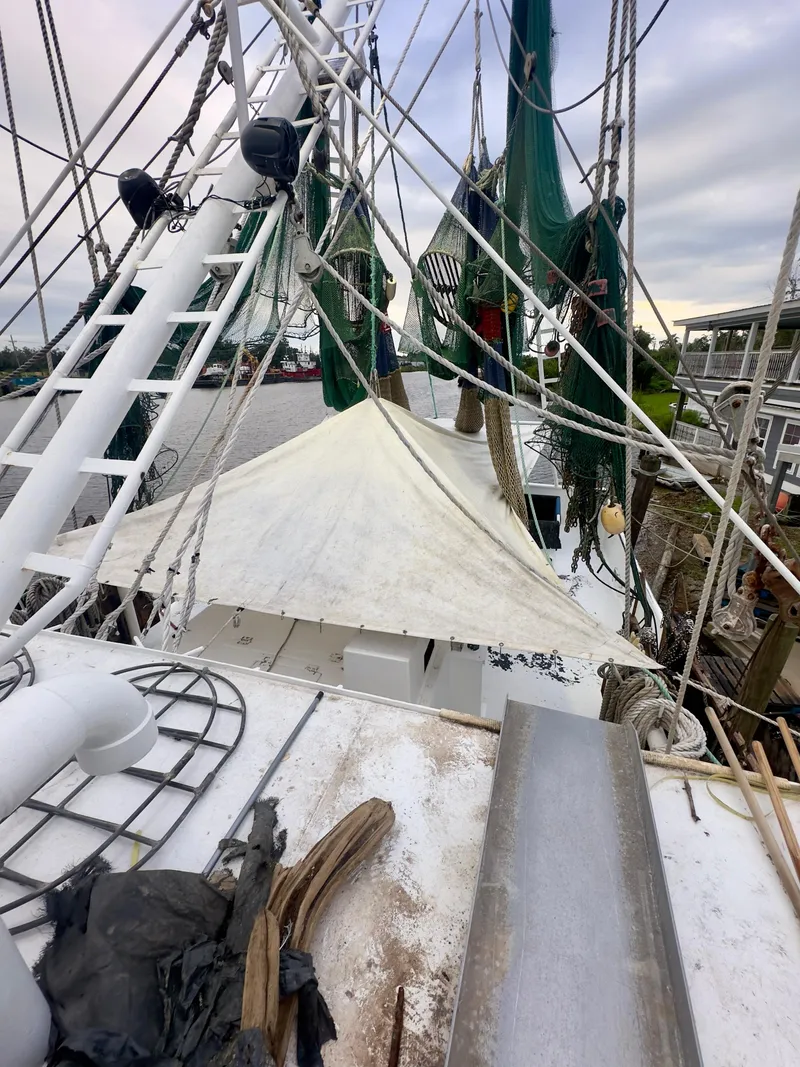 Slide: The Image of Blanchard 69 Shrimper/Freezer boat, 2001 model, with nets and rigging on deck. - 21