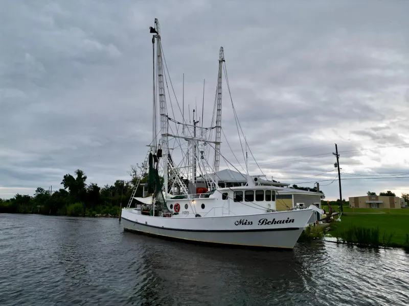 Slide: The Image of Blanchard 69 Shrimper/Freezer boat docked on a cloudy day, 2001 model. - 3