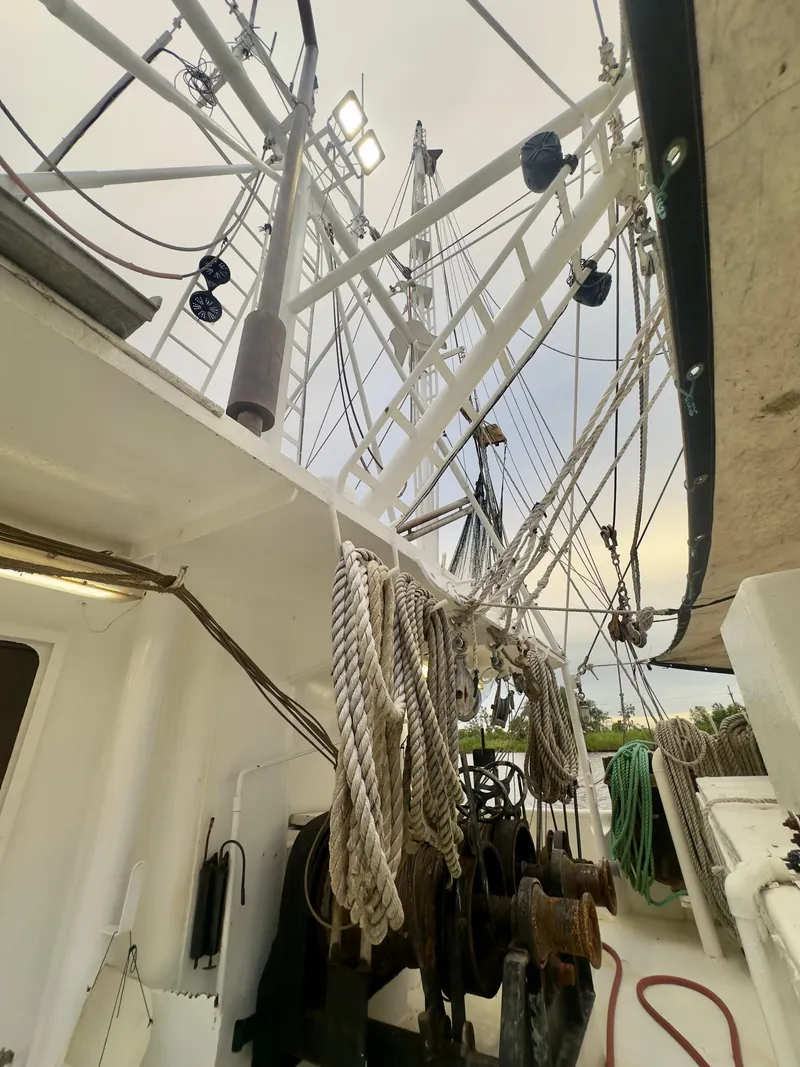 Slide: The Image of Blanchard 69 Shrimper/Freezer boat, 2001 model, with rigging and ropes on deck. - 31