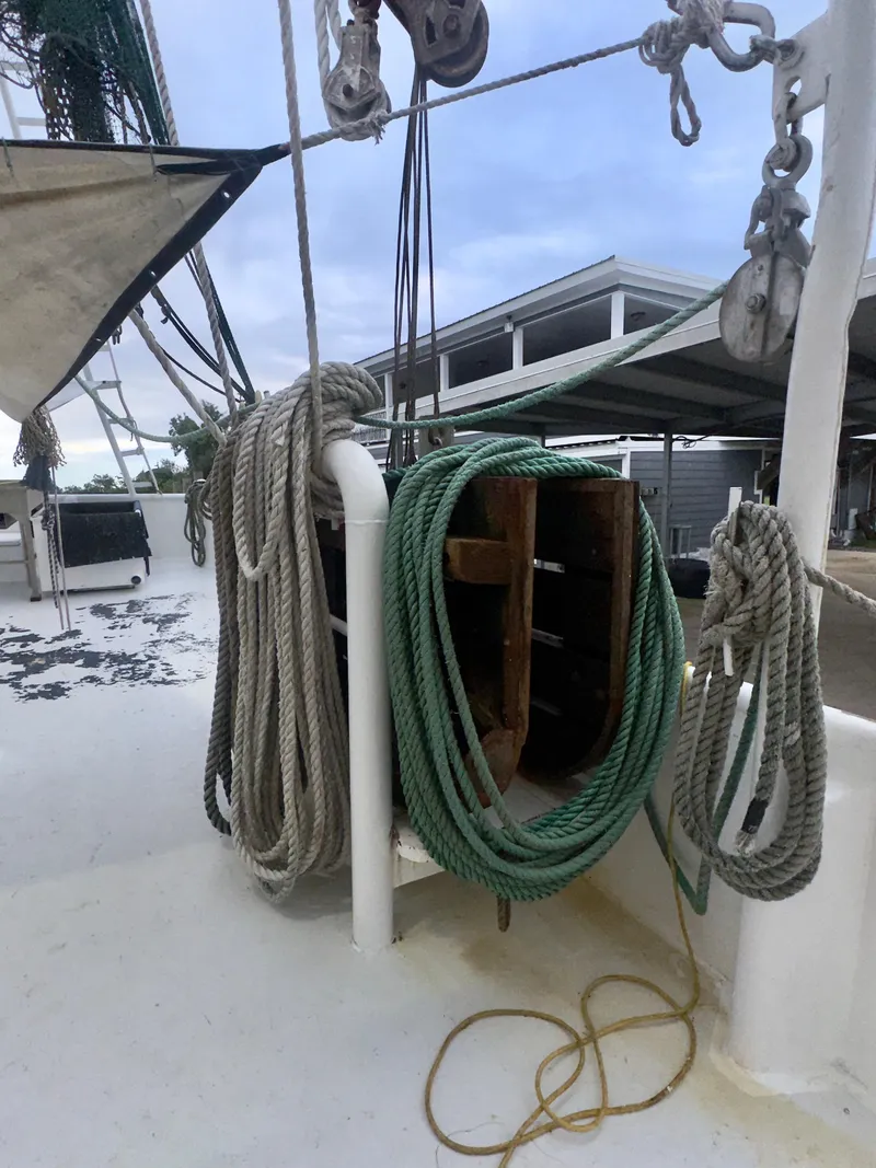 Slide: The Image of Deck of 2001 Blanchard 69 Shrimper/Freezer with ropes and pulleys. - 39