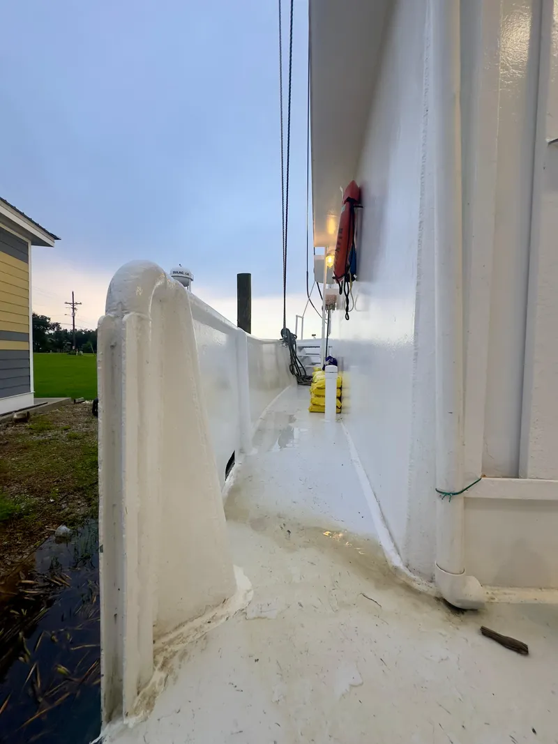 Slide: The Image of Side view of a 2001 Blanchard 69 Shrimper/Freezer boat with safety equipment. - 40