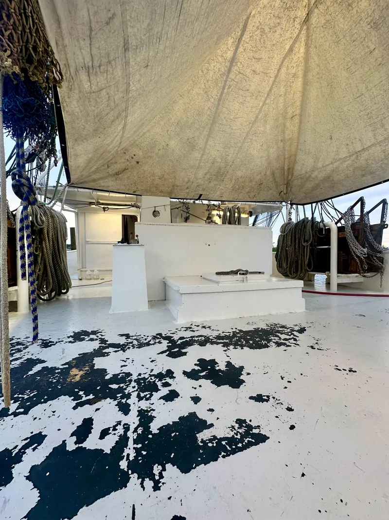 Slide: The Image of 2001 Blanchard 69 Shrimper/Freezer deck with equipment and canopy. - 48