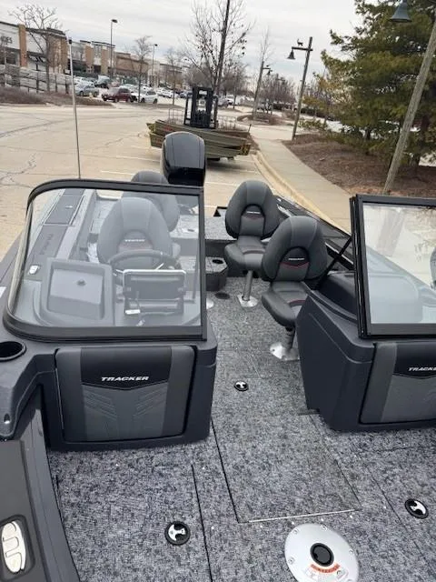 Slide: The Image of 2025 Tracker Targa V-18 WT boat interior with seating and dashboard. - 5