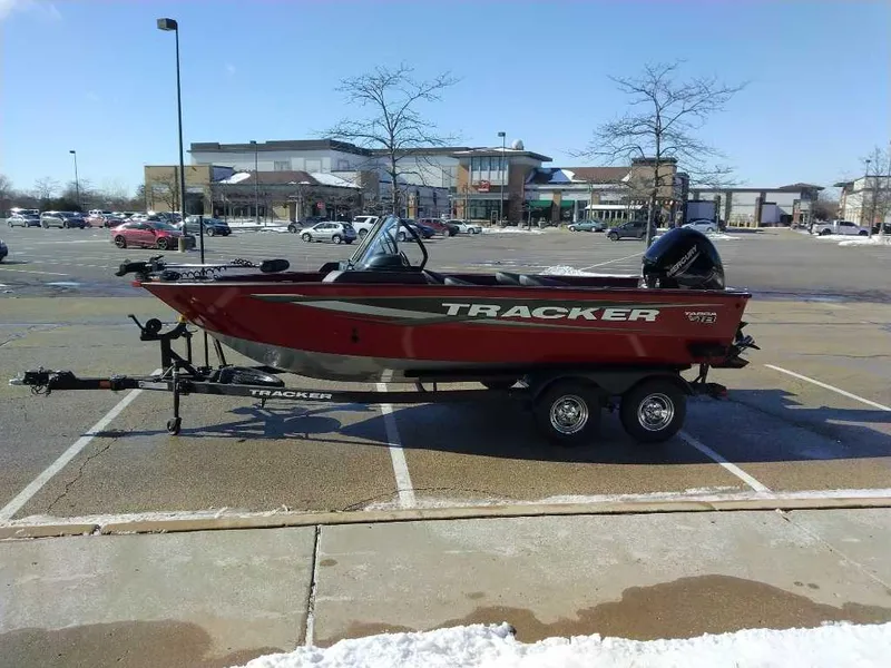 Slide: The Image of 2025 Tracker Targa V-18 Combo boat on trailer in parking lot. - 5