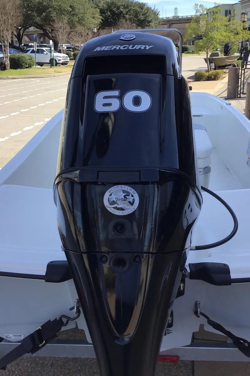 Slide: The Image of 2025 Mako Pro Skiff 15 CC with Mercury 60 outboard motor. - 3