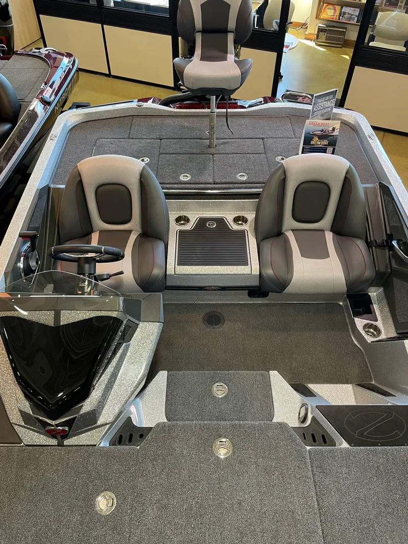 Slide: The Image of 2025 Ranger Z518 Cup-Equipped boat interior with dual seats and steering console. - 5