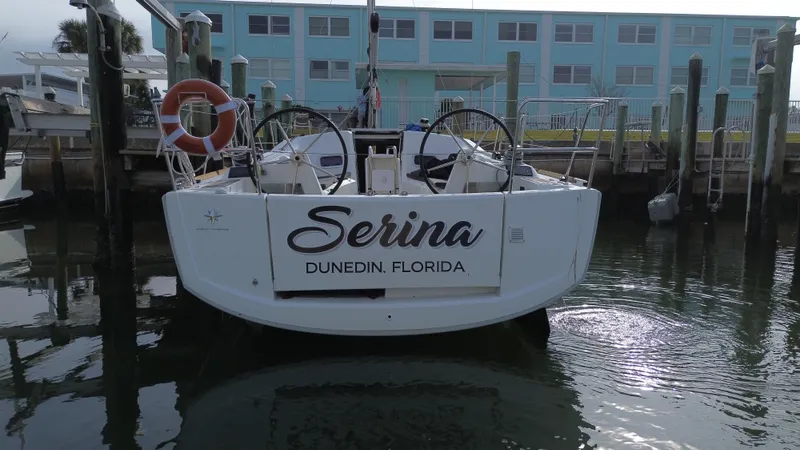 Slide: The Image of Jeanneau Sun Odyssey 349 sailboat docked, named "Serina," in Dunedin, Florida, 2021 model. - 3