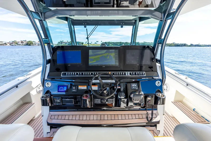 Slide: The Image of Helm of 2018 HCB 53 Sueños boat with advanced navigation systems. - 18