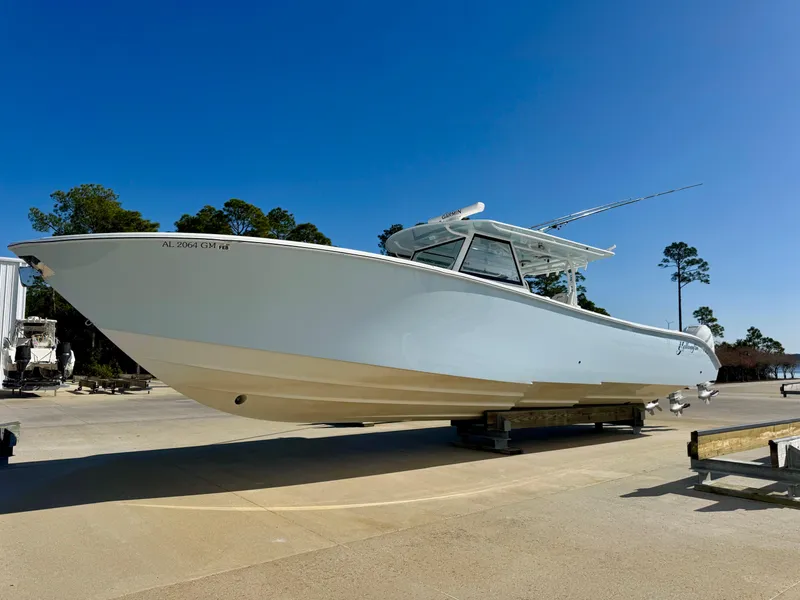 The Image of 2020 Yellowfin 42 Offshore boat on display under clear blue sky. - 1