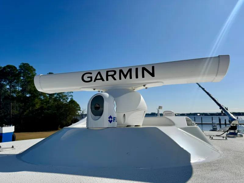 Slide: The Image of Garmin radar on 2020 Yellowfin 42 Offshore boat, clear sky background. - 13