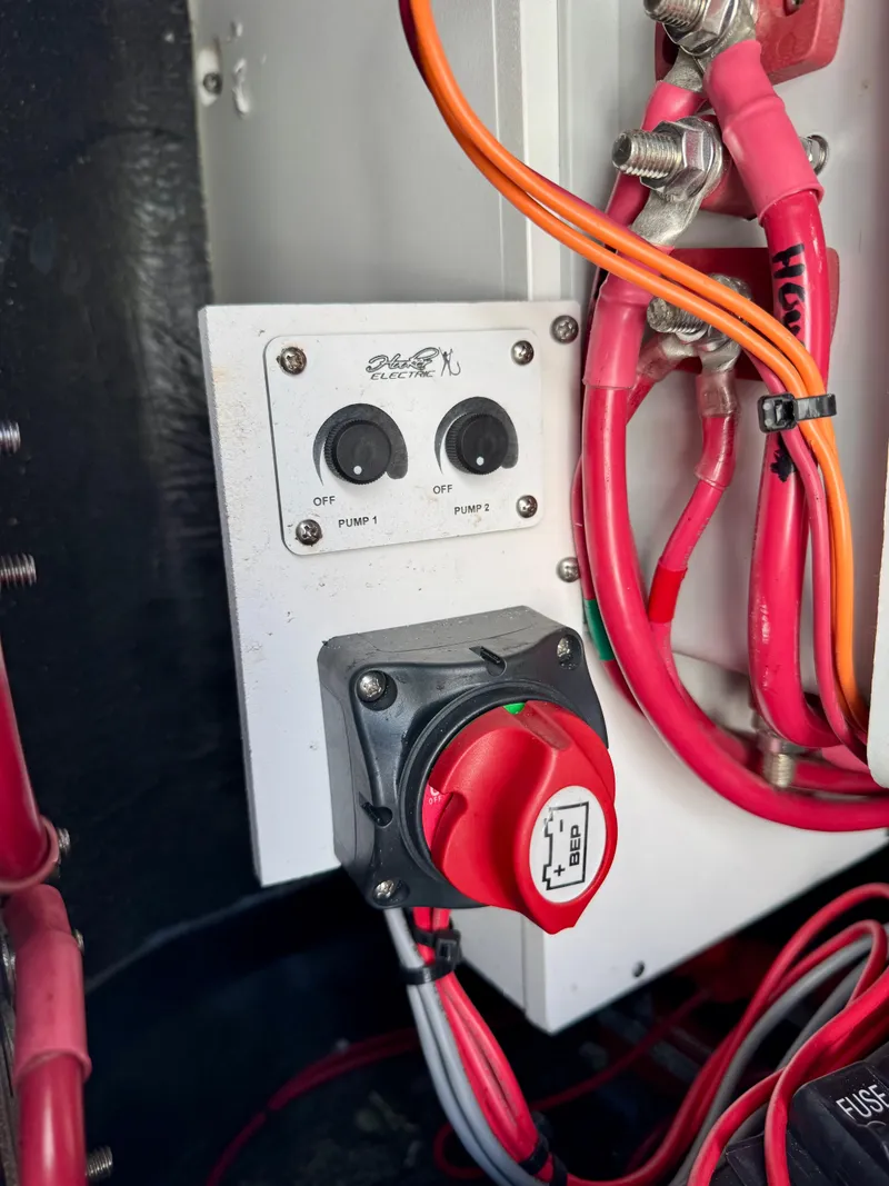 Slide: The Image of Control panel and wiring inside a 2020 Yellowfin 42 Offshore boat. - 26