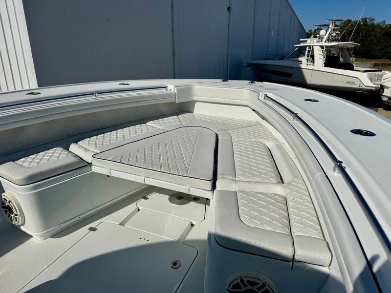 Slide: The Image of 2020 Yellowfin 42 Offshore boat with spacious seating and sleek design. - 45