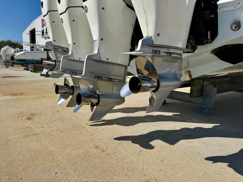 Slide: The Image of Triple outboard motors on a 2020 Yellowfin 42 Offshore boat. - 5