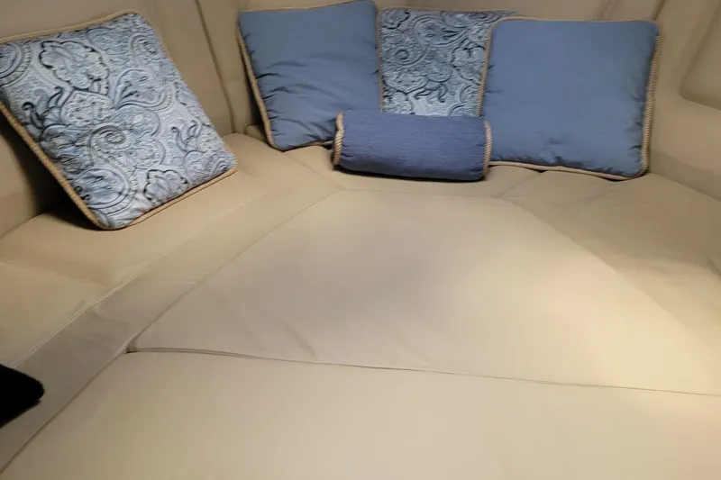Slide: The Image of Cozy interior of 2010 Cobalt 323 with blue and beige cushions. - 29