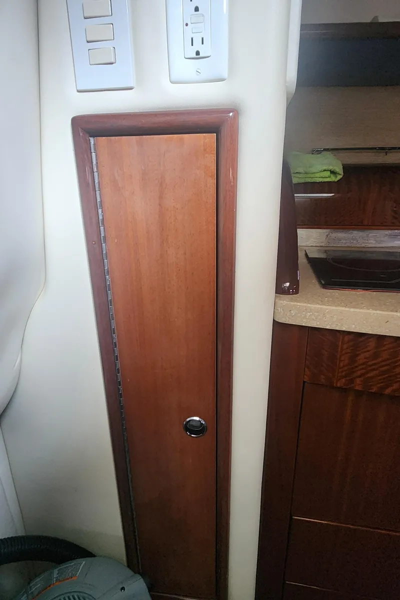 Slide: The Image of 2010 Cobalt 323 interior with wooden panel and electrical outlet. - 34