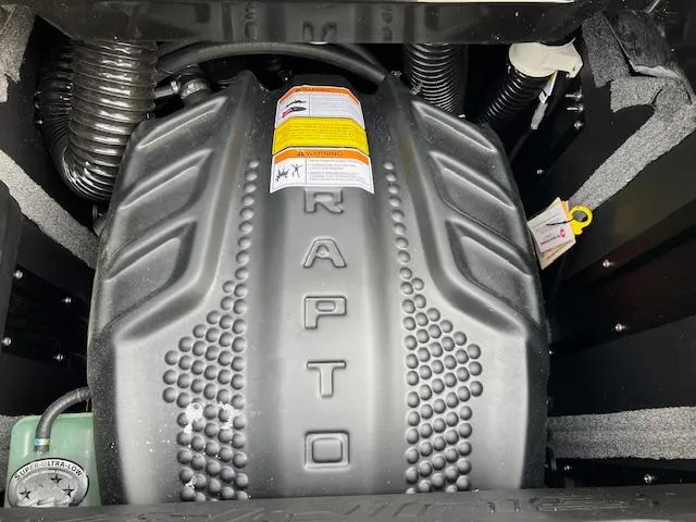 Slide: The Image of 2025 Supra SA450 engine compartment with Raptor branding, showcasing modern design and engineering. - 18