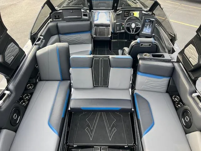 Slide: The Image of 2025 Supra SA450 boat interior with modern seating and advanced dashboard controls. - 19