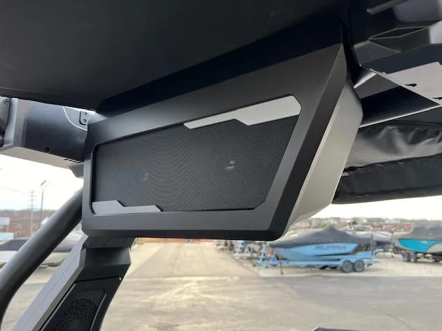 Slide: The Image of 2025 Supra SA450 boat speaker system, sleek design, outdoor setting, modern audio technology. - 21