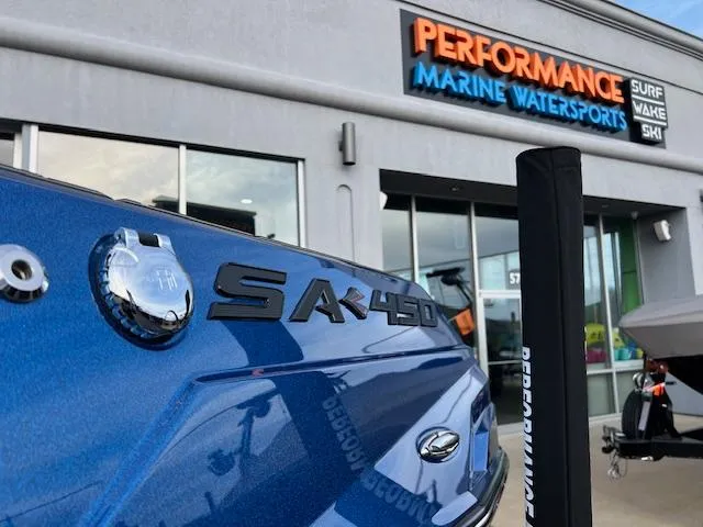 Slide: The Image of 2025 Supra SA450 boat at Performance Marine Watersports dealership. - 3