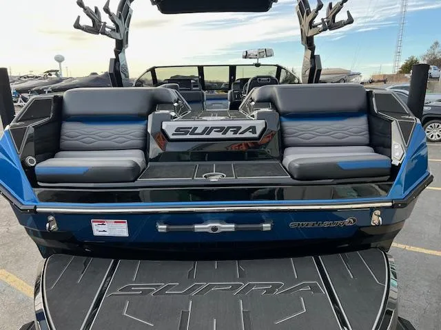 Slide: The Image of 2025 Supra SA450 boat with sleek seating and modern design. - 6