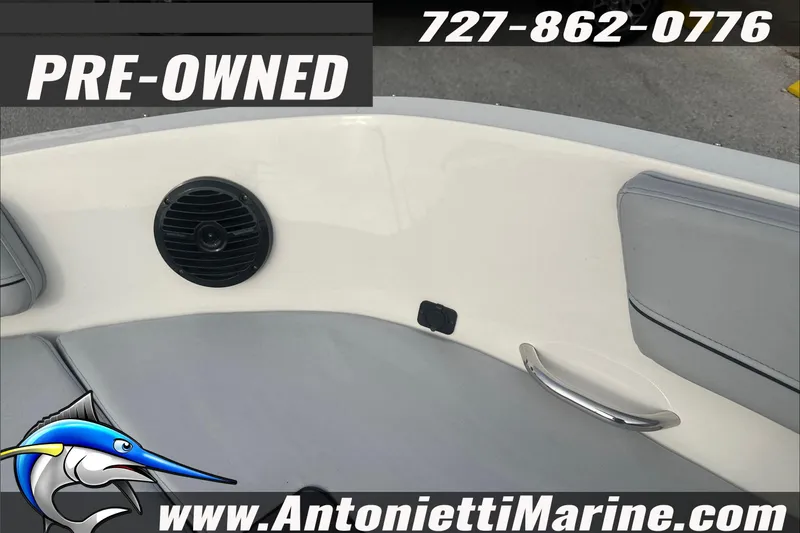 Slide: The Image of Pre-owned 2022 Bayliner VR6 Bowrider OB interior with speaker and handle, Antonietti Marine. - 6