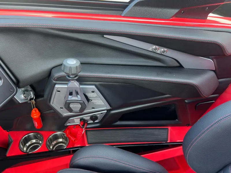 Slide: The Image of 2025 Supra SL450 interior, featuring sleek black and red design with modern controls. - 12