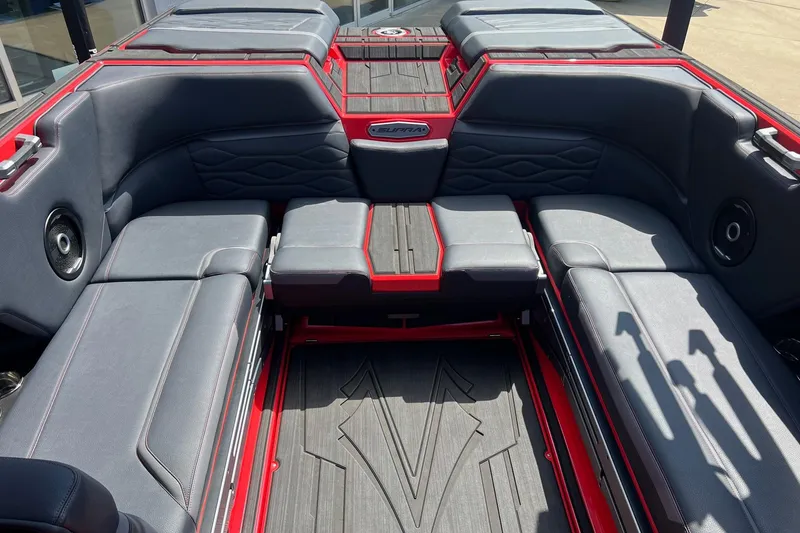 Slide: The Image of 2025 Supra SL 450 boat interior with sleek gray and red seating design. - 20
