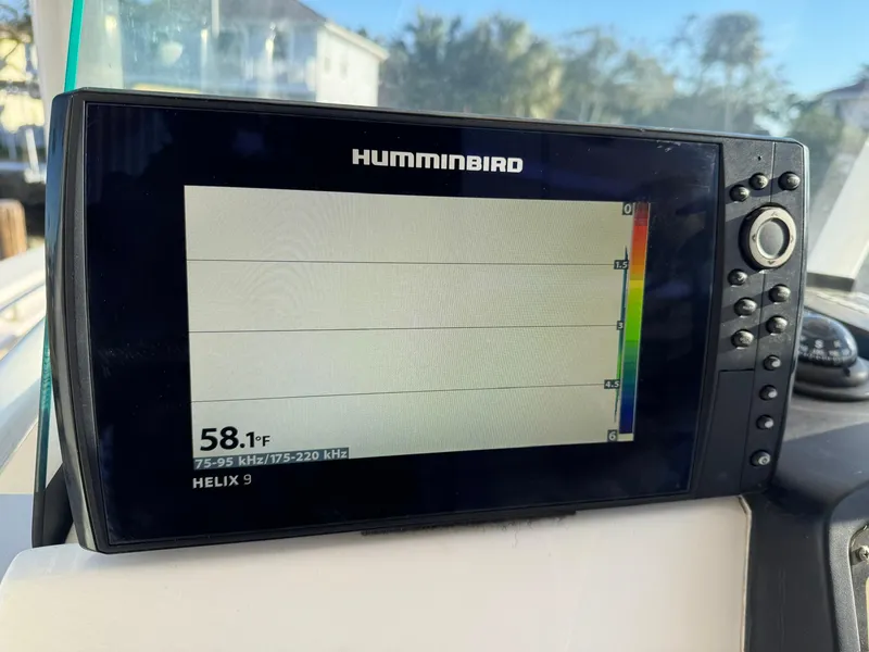 Slide: The Image of Humminbird Helix 9 fish finder on 2018 Sea Fox 226 Commander, displaying 58.1°F water temperature. - 12