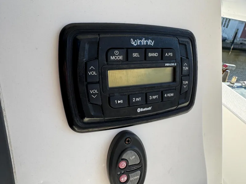 Slide: The Image of Infinity audio system on 2018 Sea Fox 226 Commander boat dashboard. - 16