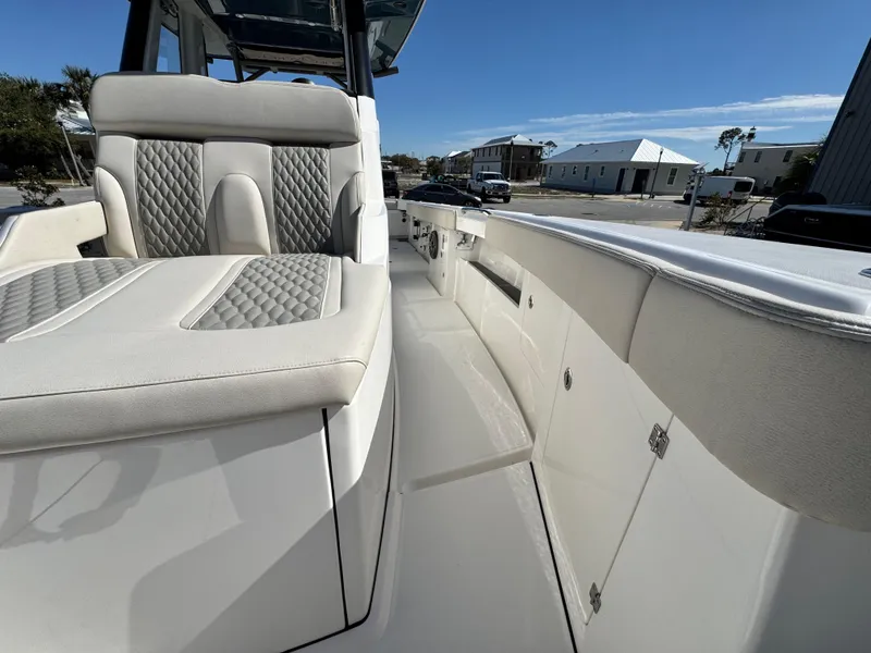 Slide: The Image of 2025 Solace 32 CS boat interior with luxurious seating and sleek design. - 34