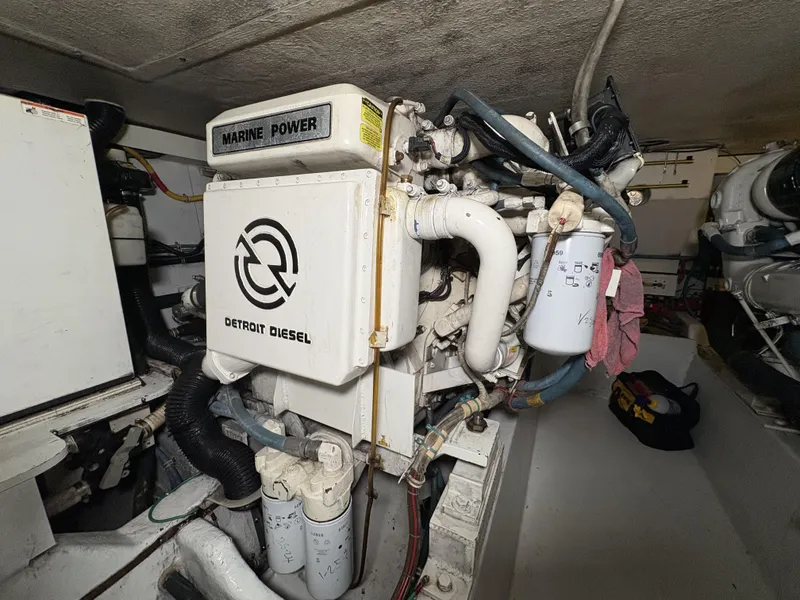 Slide: The Image of Engine room of 1998 Hatteras 52 Sport Deck Motor Yacht with Detroit Diesel engine. - 27