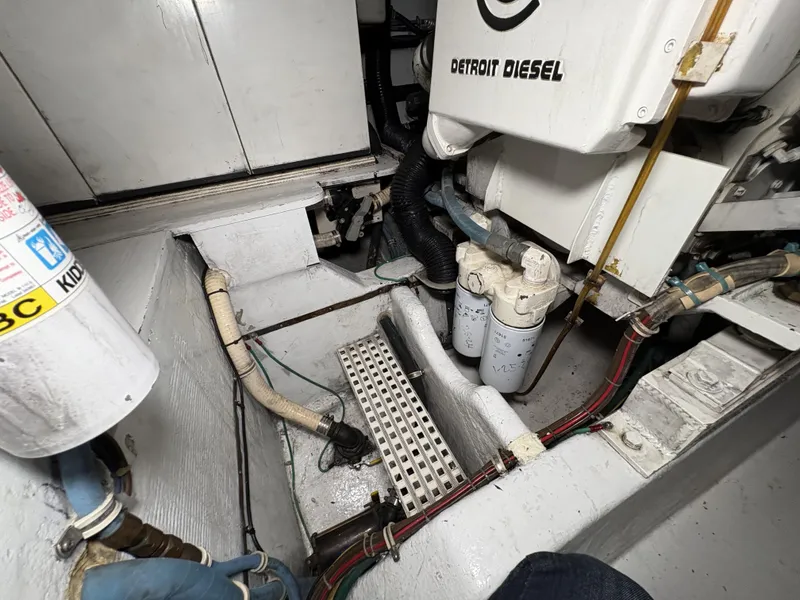 Slide: The Image of Engine room of 1998 Hatteras 52 Sport Deck Motor Yacht with Detroit Diesel components. - 32