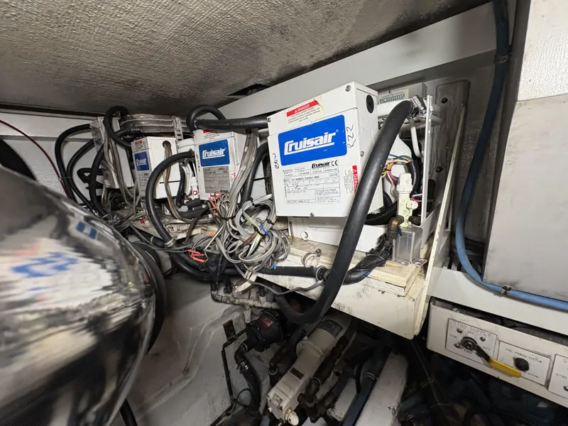 Slide: The Image of Engine room of 1998 Hatteras 52 Sport Deck Motor Yacht with Cruiseair systems. - 35