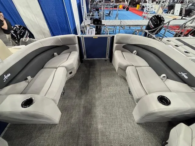 Slide: The Image of 2025 Barletta ARIA 20QC pontoon boat interior with gray seating and cup holders. - 19