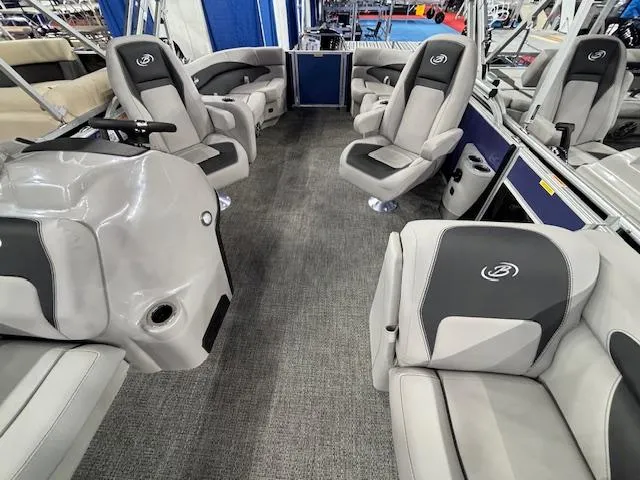 Slide: The Image of 2025 Barletta ARIA 20QC pontoon boat interior with gray seating and modern design. - 22