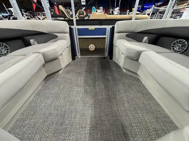 Slide: The Image of Interior of 2025 Barletta ARIA 20QC pontoon boat with plush seating and modern design. - 4