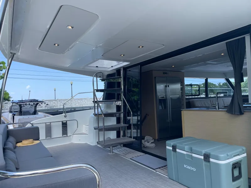 Slide: The Image of Luxury interior of 2020 Fountaine Pajot MY 44 yacht with modern amenities and seating area. - 10