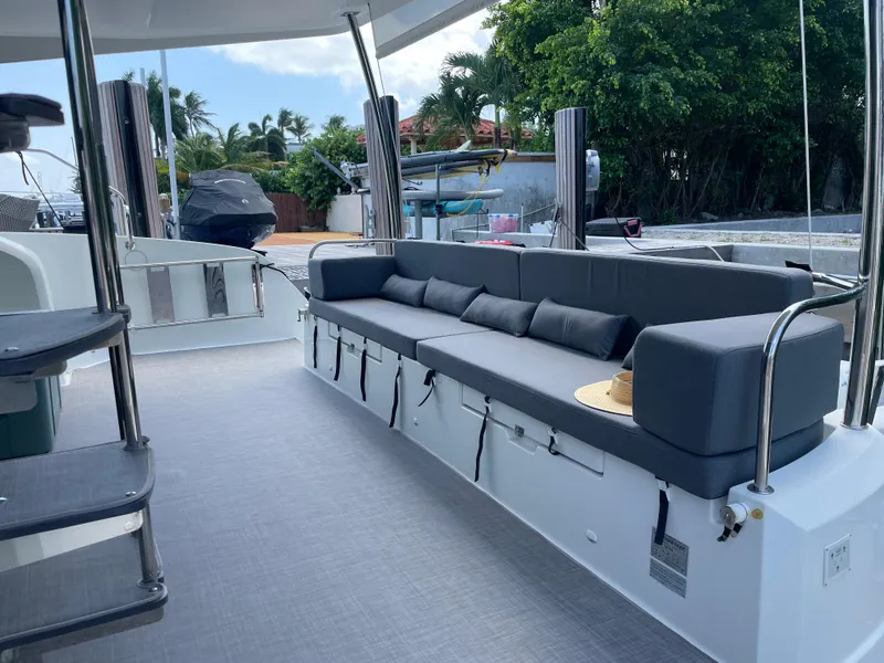Slide: The Image of Spacious deck of 2020 Fountaine Pajot MY 44 with comfortable seating and modern design. - 11