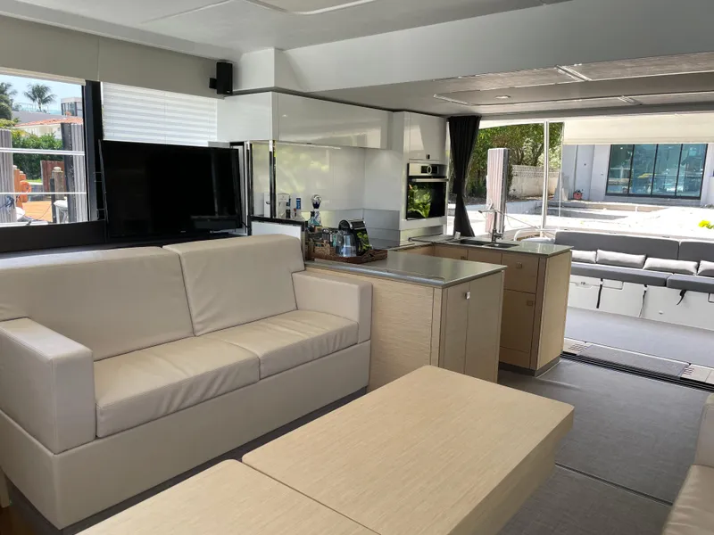 Slide: The Image of Luxurious interior of 2020 Fountaine Pajot MY 44 yacht with modern furnishings and spacious layout. - 33