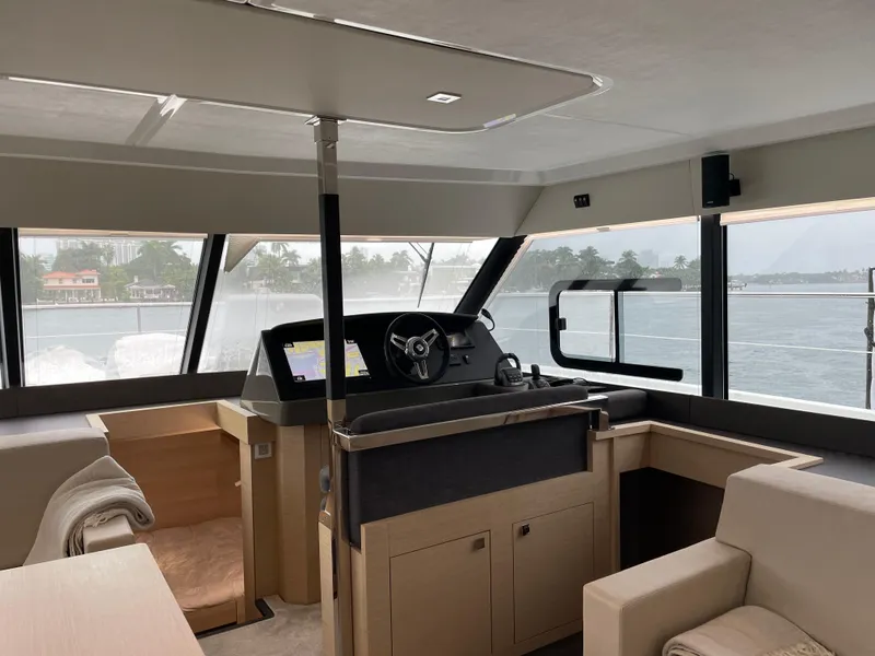 Slide: The Image of Interior view of 2020 Fountaine Pajot MY 44 yacht helm with panoramic windows. - 38