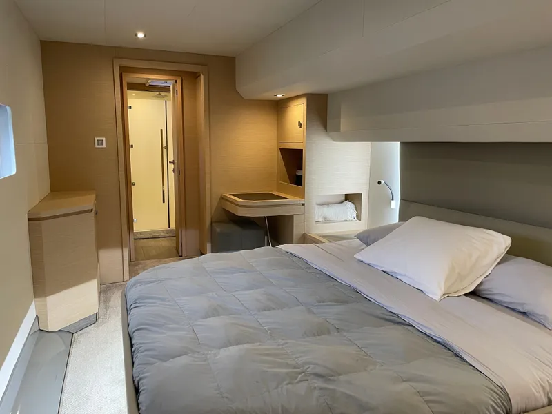 Slide: The Image of Luxurious bedroom interior of 2020 Fountaine Pajot MY 44 yacht, featuring modern design and cozy bedding. - 41