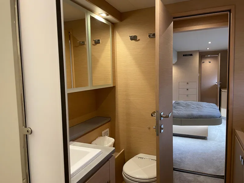 Slide: The Image of Interior of 2020 Fountaine Pajot MY 44 yacht, featuring a bathroom and bedroom. - 43