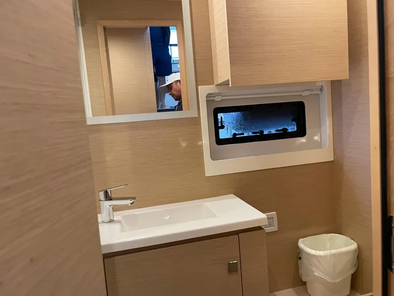 Slide: The Image of Bathroom interior of 2020 Fountaine Pajot MY 44 yacht with sink and window. - 46